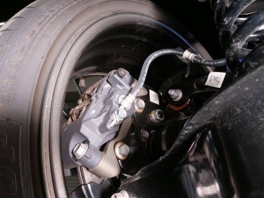 Cusco GR Corolla Light Weight Rear Brake Caliper Bracket