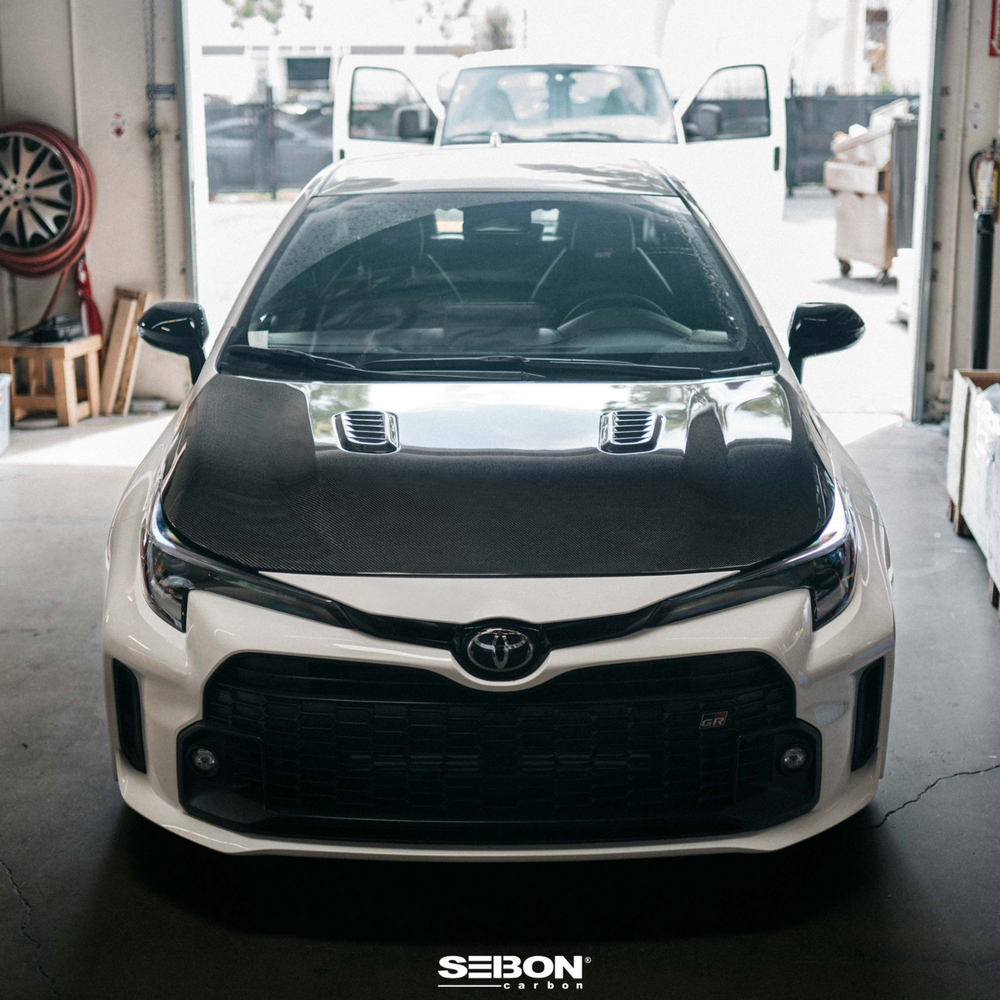 Seibon GR Corolla OE-Style Double-Sided Carbon Fiber Hood - Gloss Finish