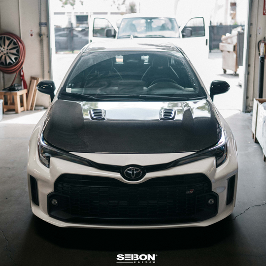 Seibon GR Corolla OE-Style Double-Sided Carbon Fiber Hood - Gloss Finish