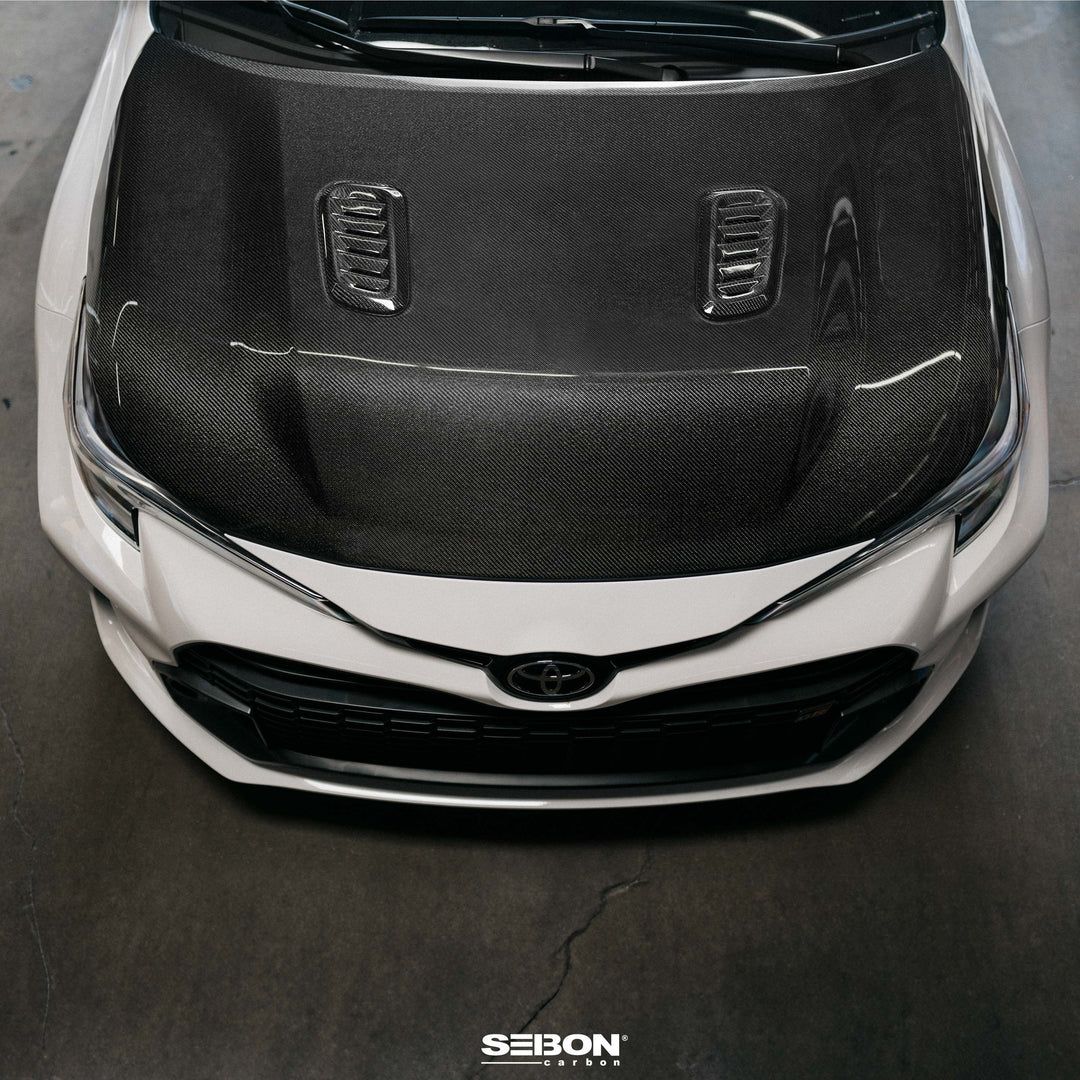 Seibon GR Corolla OE-Style Double-Sided Carbon Fiber Hood - Gloss Finish