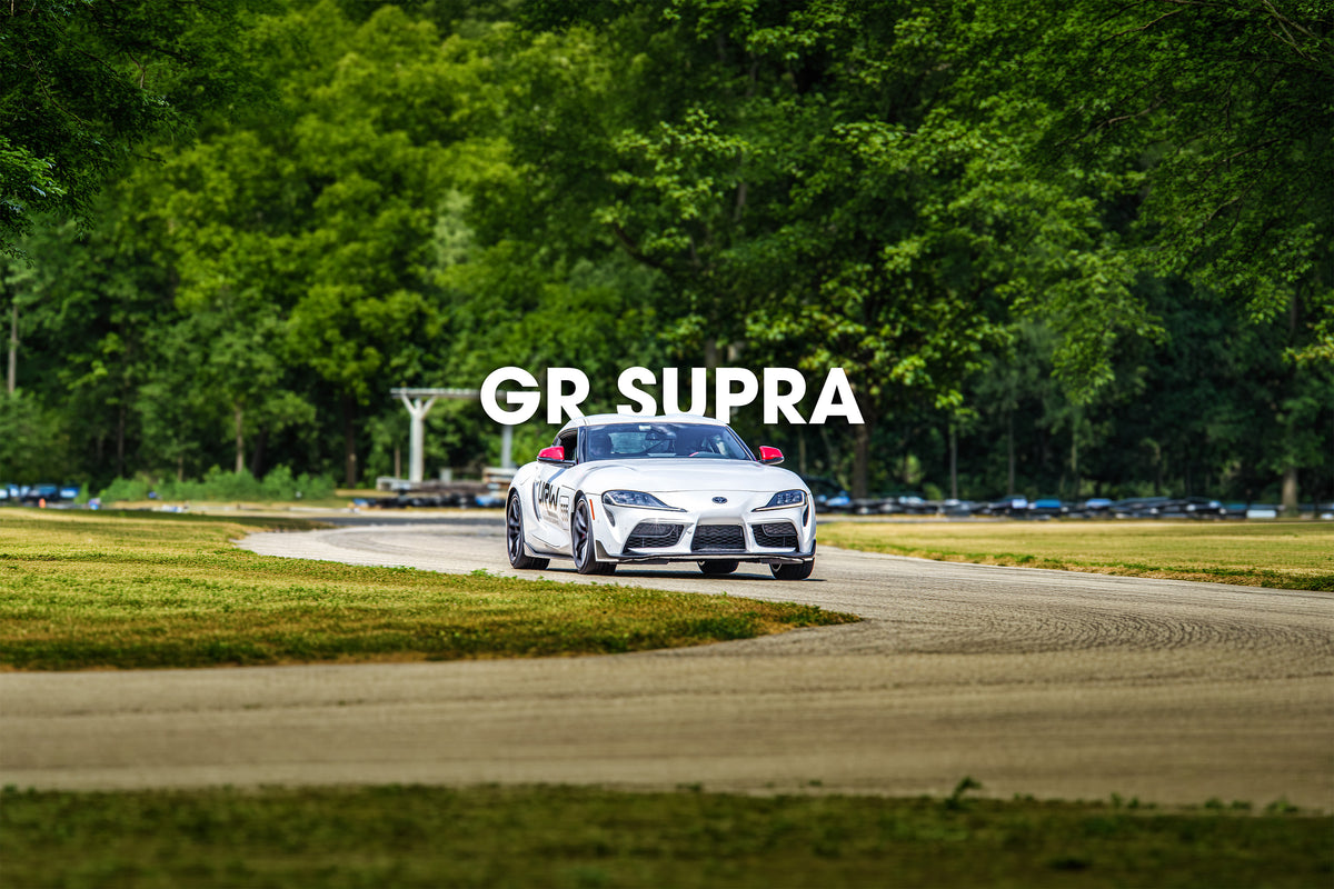 White Toyota GR Supra on a race track